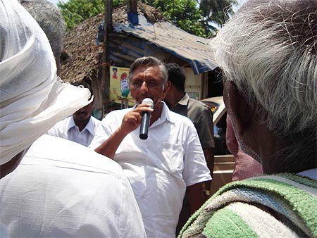 At meetings Aiyar is clad in the simple white dhoti-shirt of his constituency and speaks Tamil