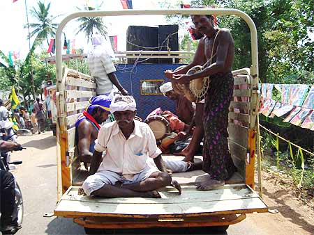 A van carrying folk performers, part of Aiyar's campaign