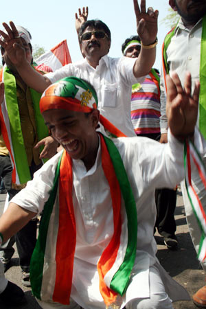 Congress workers celebrate in New Delhi