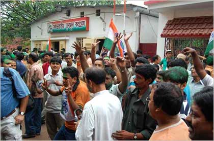 Trinamool supporters celebrate outside Mamata's residence
