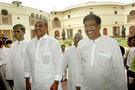 Andhra Pradesh CM Y S Rajshekara Reddy with fellow party MP Gireeshkumar Sanghi