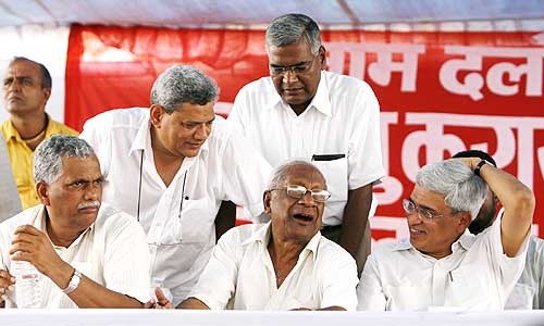 (L to R) Senior leaders Debabrata Biswas, Sitaram Yechury, A B Bardhan, D Raja (standing) and Prakash Karat during a rally in New Delhi