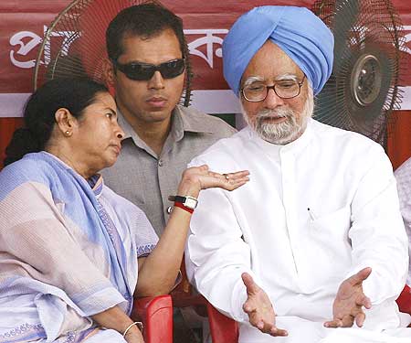 Dr Singh in conversation with Trinamool Congress party chief Mamata Banerjee