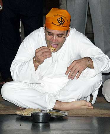 Rahul eats at a community kitchen after paying homage at the Golden Temple in Amritsar