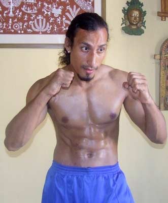 Muay Thai instructor Biki Bora shows you how to get that six-pack