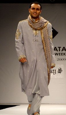 In a rare occasion, Indian cricketer Virender Sehwag walked the ramp for ace designer Rocky S on the first day of Kolkata Fashion Week (KFW) II in September 2009