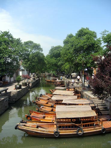 Tongli Water Town near Suzhou, is a well-preserved tourist spot with water lanes.