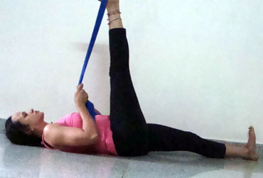 Supta Hasta Padangushtasana helps tone legs and improves flexibility