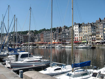 Picture perfect Honfleur. Spend a relaxing afternoon there and save on the cost of a postcard.