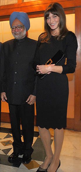 President Sarkozy, Prime Minister Manmohan Singh and Carla prior to a dinner at the Prime Minister's residence in New Delhi, December 5