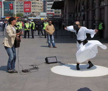 A whirling dervish wearing a gas mask, at an environmental protest in Istanbul. Anirvan and Barnali were in Turkey when activists there gathered to commemorate the 24th anniversary of Ukraine's Chernobyl disaster.
