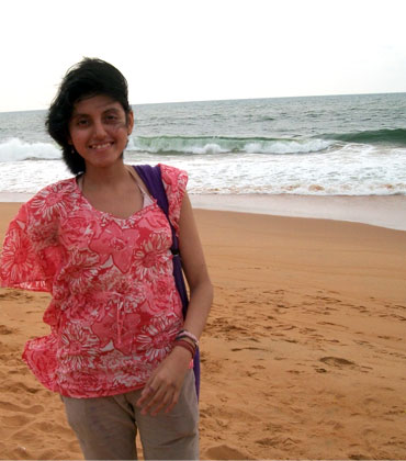 Shreya enjoys a walk on the beach in Kerala