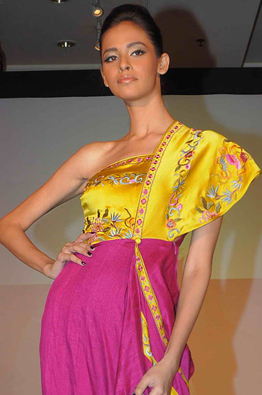 A model walks in one of James Ferreira's creations