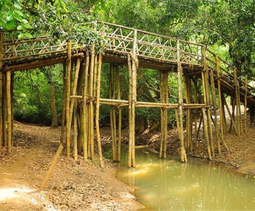 One of the temporary bridges in Kuruva Island, 950-acre protected river delta on the Kabini River in the Wayanad district, India.