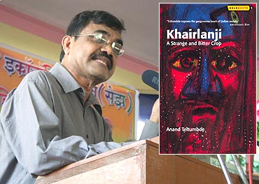 Dr Anand Teltumbde at a public hearing in Pen against SEZs. Inset: Cover of his book Khairlanji: A Strange and Bitter Crop