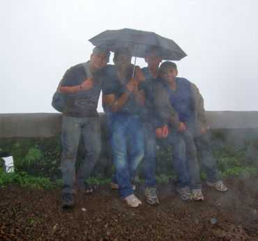 Four men and an umbrella!