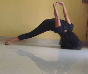 Sirsha angustha yogasana (Head to toe pose)