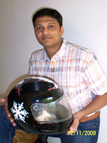 George Koshy with his cooled helmet