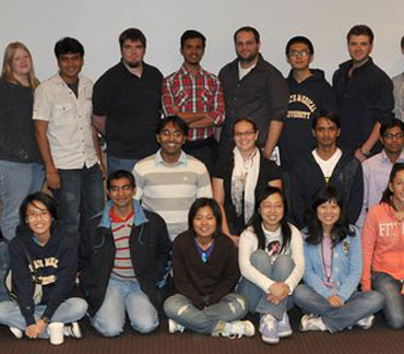 Caezaan (sitting second from left) at SUNY Upstate