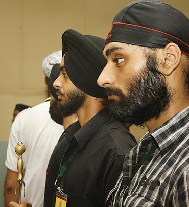 The aspirants line up during a rehearsal at the gurdwara complex