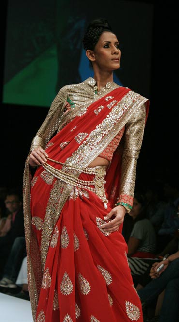 A model showcases Shyamal and Bhumika's creation