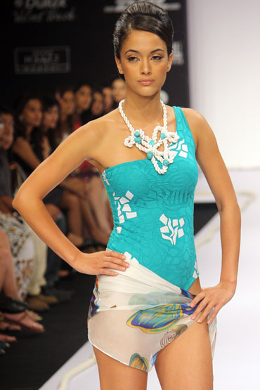An Arpan Vohra swimsuit, topped off with a sarong