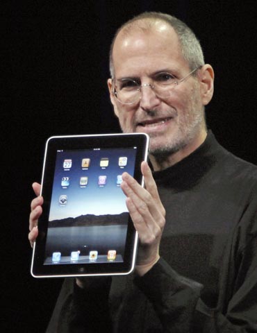 Apple chief executive officer Steve Jobs with the new iPad