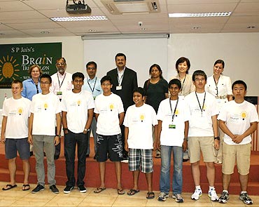 Harsh (4th from left in the lower row) with the 8 finalists who qualified for the final round
