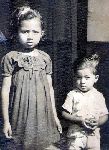 Dr Prafulla C Deka (right) with his sister back in 1955