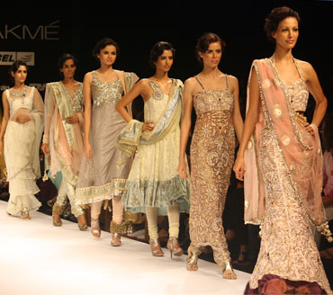 Models line the ramp at the closing of Jatin Varma's showing on Day One of the LFW