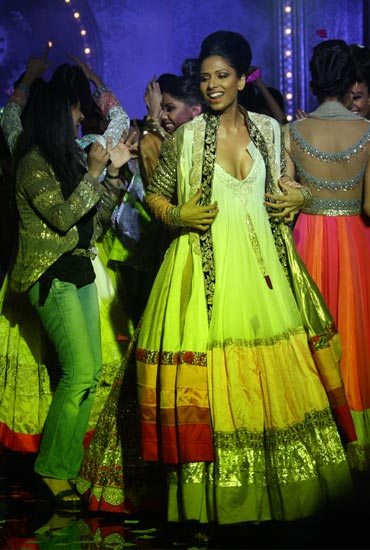 Spectators dance with the models at the close of Manish Malhotra's showing
