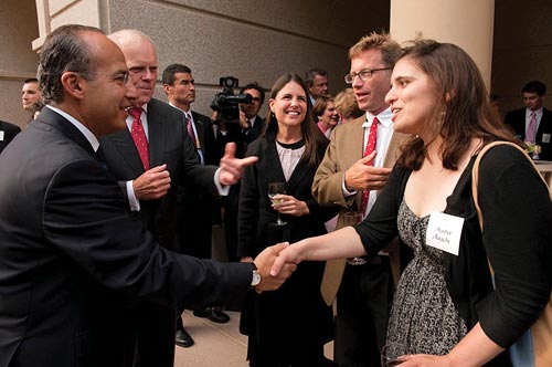 Aysha Bagchi (right) meets Mexican President Felipe Calderon (left)