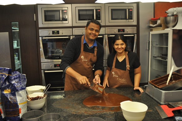 Gouri Patwardhan with her husband taking lessons in chocolate making