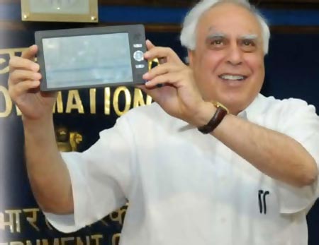 India's minister of communications and information technology Kapil Sibal unveiling Aakash