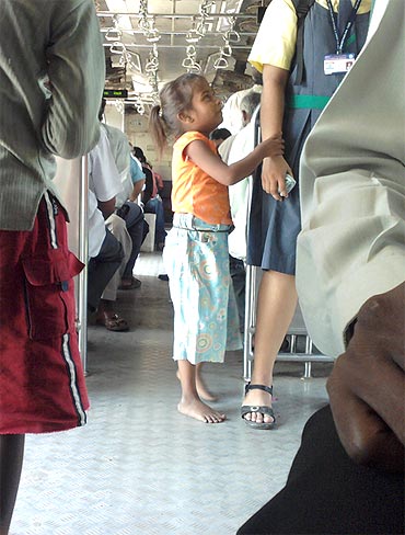 Children begging in Mumbai local train