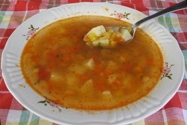 Begin dinner with a clear soup containing vegetables