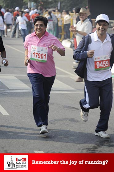 Ferose participating in a marathon along with social activist Kiran Bedi
