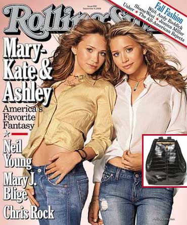 Mary Kate and Ashley Olsen and (inset) their exclusive crocodile backpack