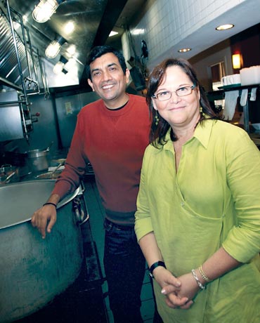 Sanjeev Kapoor, left, cooked along with Bonnie Benwick, deputy food editor, The Washington Post, at the Indique Heights kitchen