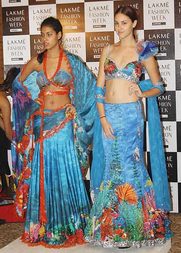 Models sporting Satya Paul saris during the fittings