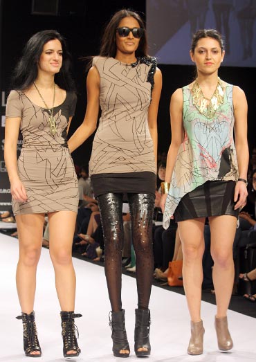 Anna-Liza Ganguly and Anita Walia with Surelee Joseph (centre) in one of their deux A designs