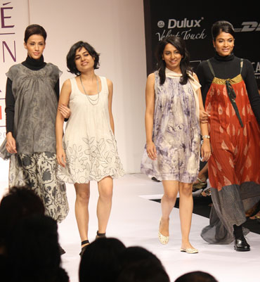 Kiran and Meghna alongside two of their creations