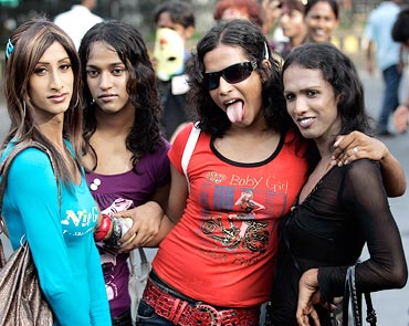 Gay rights activists pose as they take part in a rally in the eastern Indian city of Kolkata July