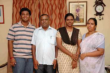 From left: Divyadrashini's brother, father and mother