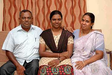 S Divyadarshini with her father and mother