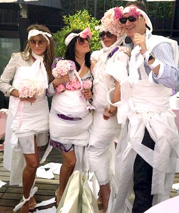 Victoria Beckham (second from right) with friends at her baby shower