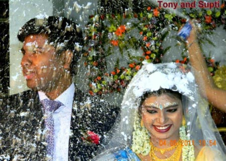 Tony Murmu on his wedding day with his wife