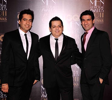 Rohit Gandhi and Rahul Khanna with an unidentified guest at the GQ Awards