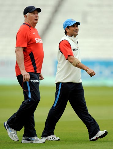 Sachin Tendulkar  walks with coach Duncan Fletcher