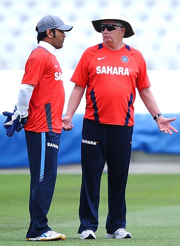 Mahendra Singh Dhoni of India talks with Duncan Fletcher during Net Practice ahead of the second Test match at Trent Bridge on July 28, 2011 in Nottingham, England.